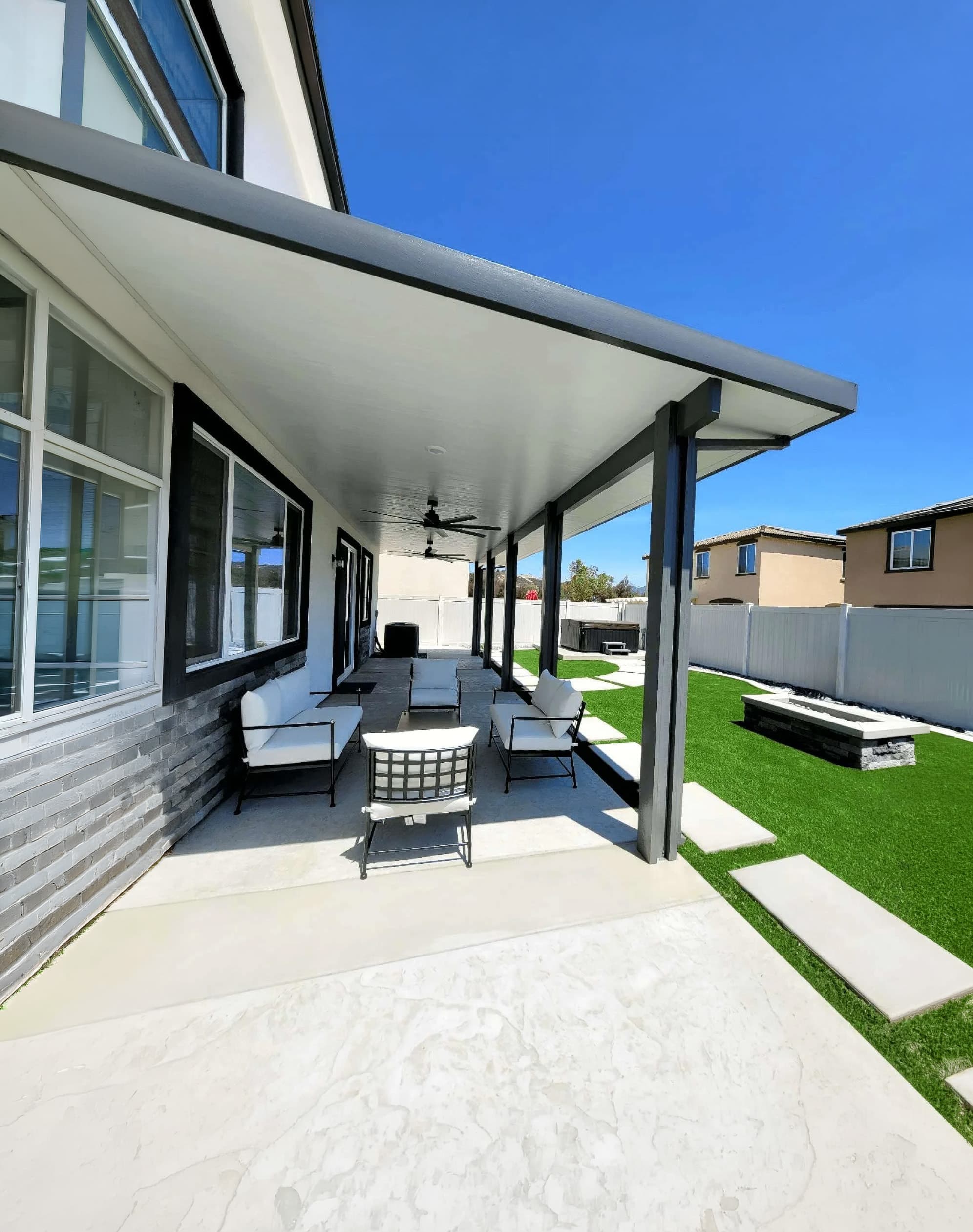Modern patio cover installation by AJ Shades